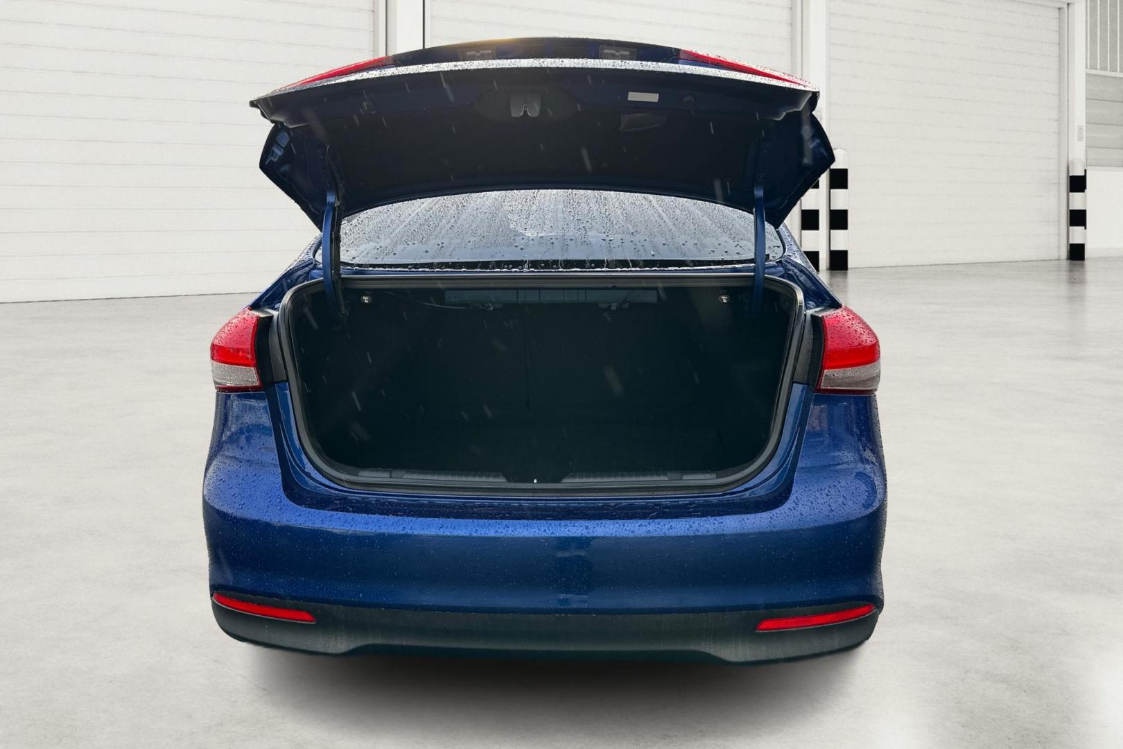 2018 Blue Kia Forte LX 6M (3KPFK4A77JE) with an 2.0L L4 DOHC 16V engine, 6M transmission, located at 7755 State Street, Midvale, UT, 84047, (801) 753-9063, 40.610329, -111.890656 - Photo#13