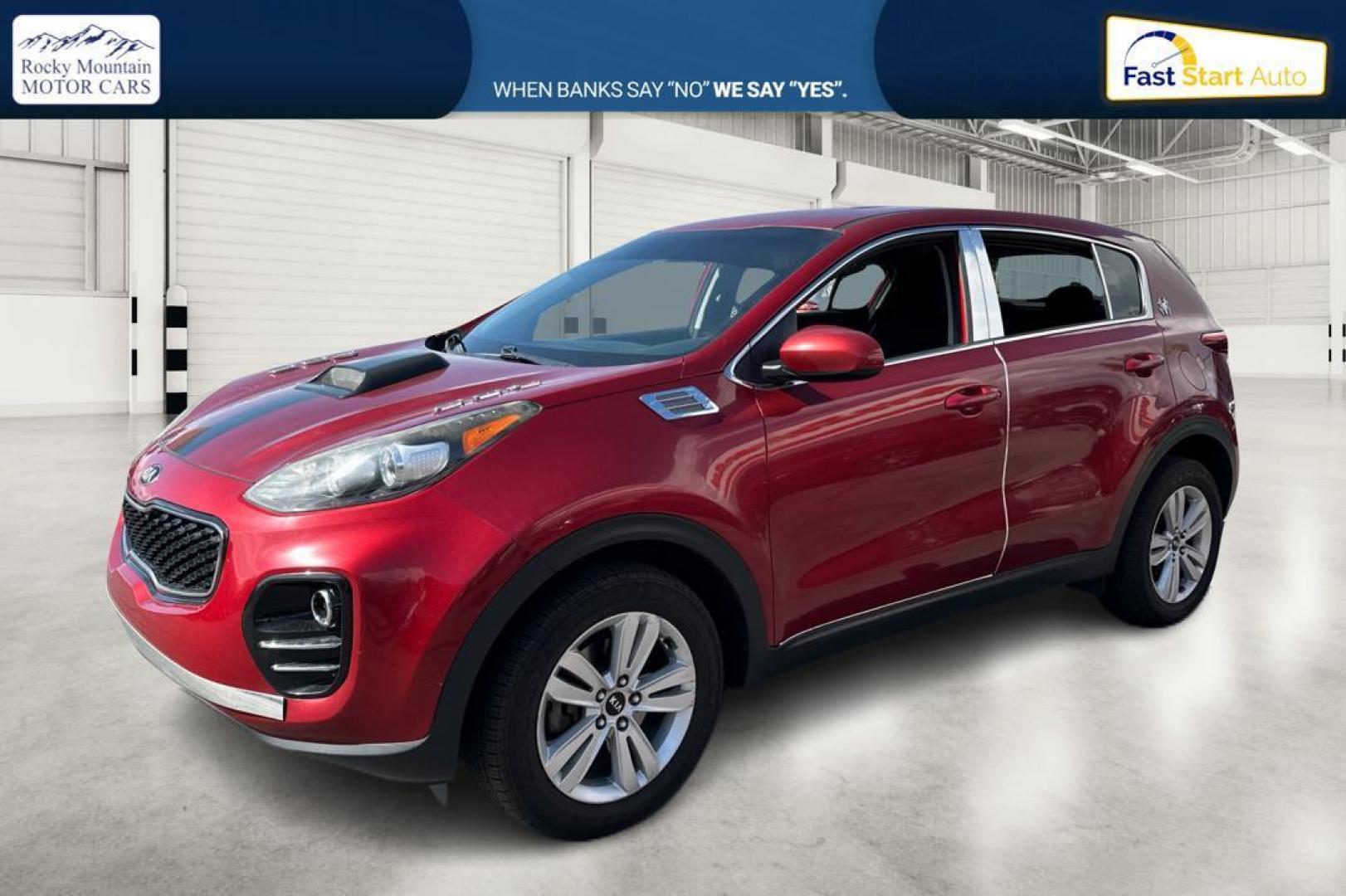 2018 Red Kia Sportage LX AWD (KNDPMCACXJ7) with an 2.4L V6 DOHC 24V engine, 6A transmission, located at 767 S State Road, Pleasant Grove, UT, 84062, (801) 785-1058, 40.354839, -111.736687 - Photo#6
