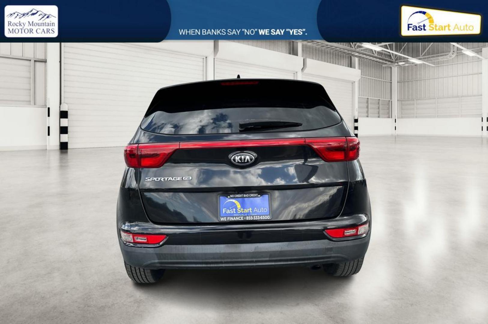 2018 Black Kia Sportage LX FWD (KNDPM3AC4J7) with an 2.4L V6 DOHC 24V engine, 6A transmission, located at 7755 State Street, Midvale, UT, 84047, (801) 753-9063, 40.610329, -111.890656 - Photo#4