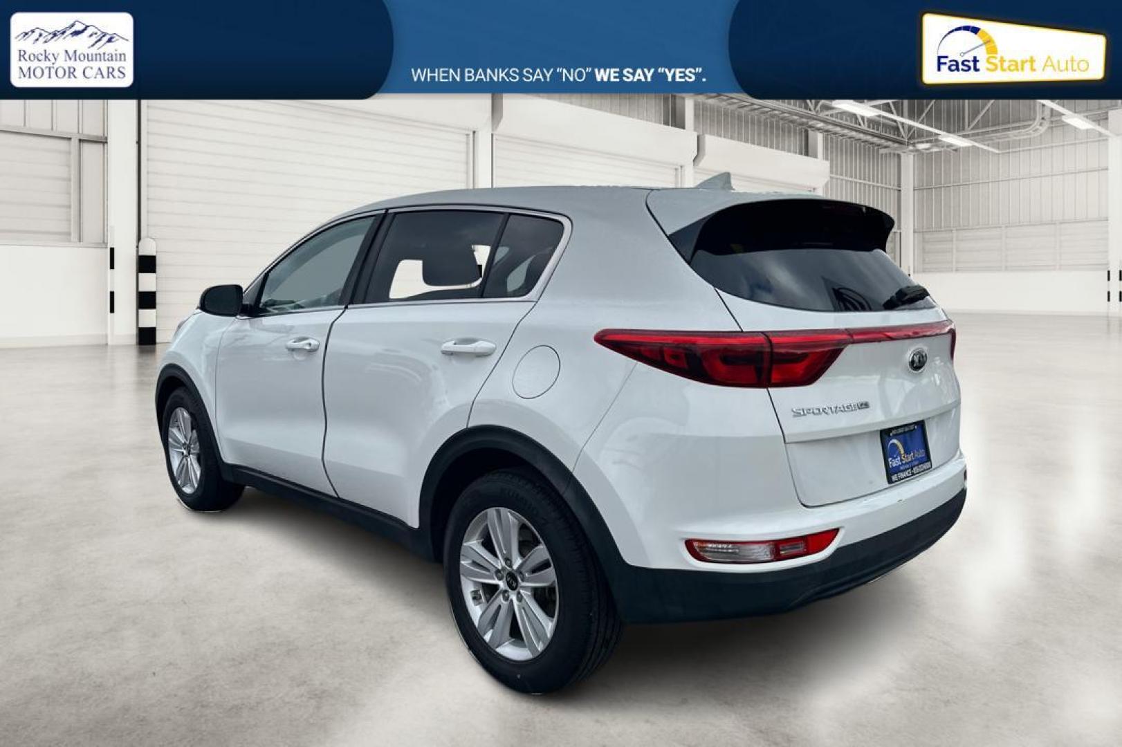 2018 White Kia Sportage LX FWD (KNDPM3AC7J7) with an 2.4L V6 DOHC 24V engine, 6A transmission, located at 7755 State Street, Midvale, UT, 84047, (801) 753-9063, 40.610329, -111.890656 - Photo#5