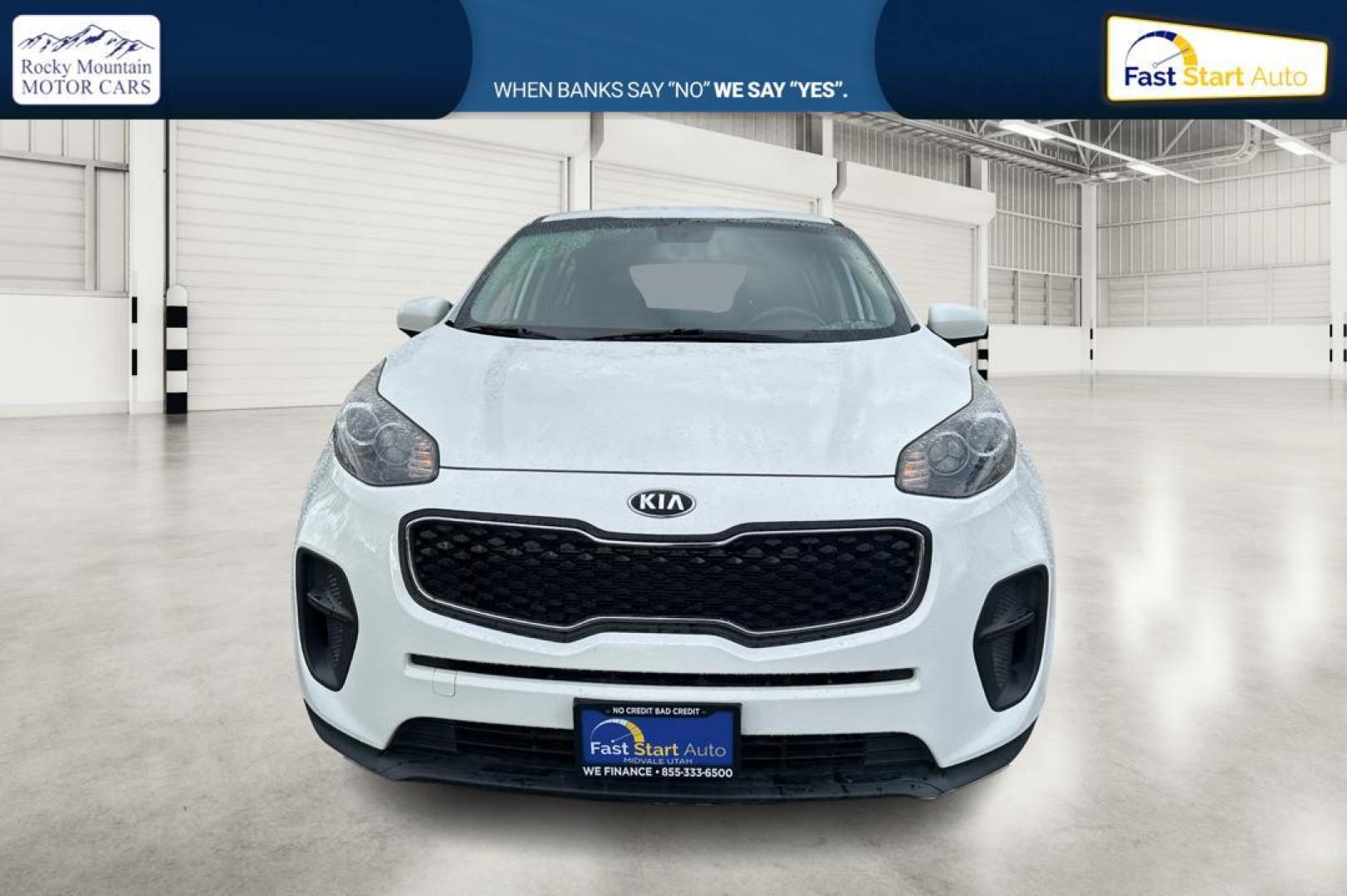 2018 White Kia Sportage LX FWD (KNDPM3AC7J7) with an 2.4L V6 DOHC 24V engine, 6A transmission, located at 7755 State Street, Midvale, UT, 84047, (801) 753-9063, 40.610329, -111.890656 - Photo#9