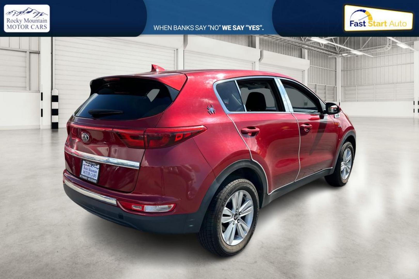 2018 Red Kia Sportage LX AWD (KNDPMCACXJ7) with an 2.4L V6 DOHC 24V engine, 6A transmission, located at 767 S State Road, Pleasant Grove, UT, 84062, (801) 785-1058, 40.354839, -111.736687 - Photo#2