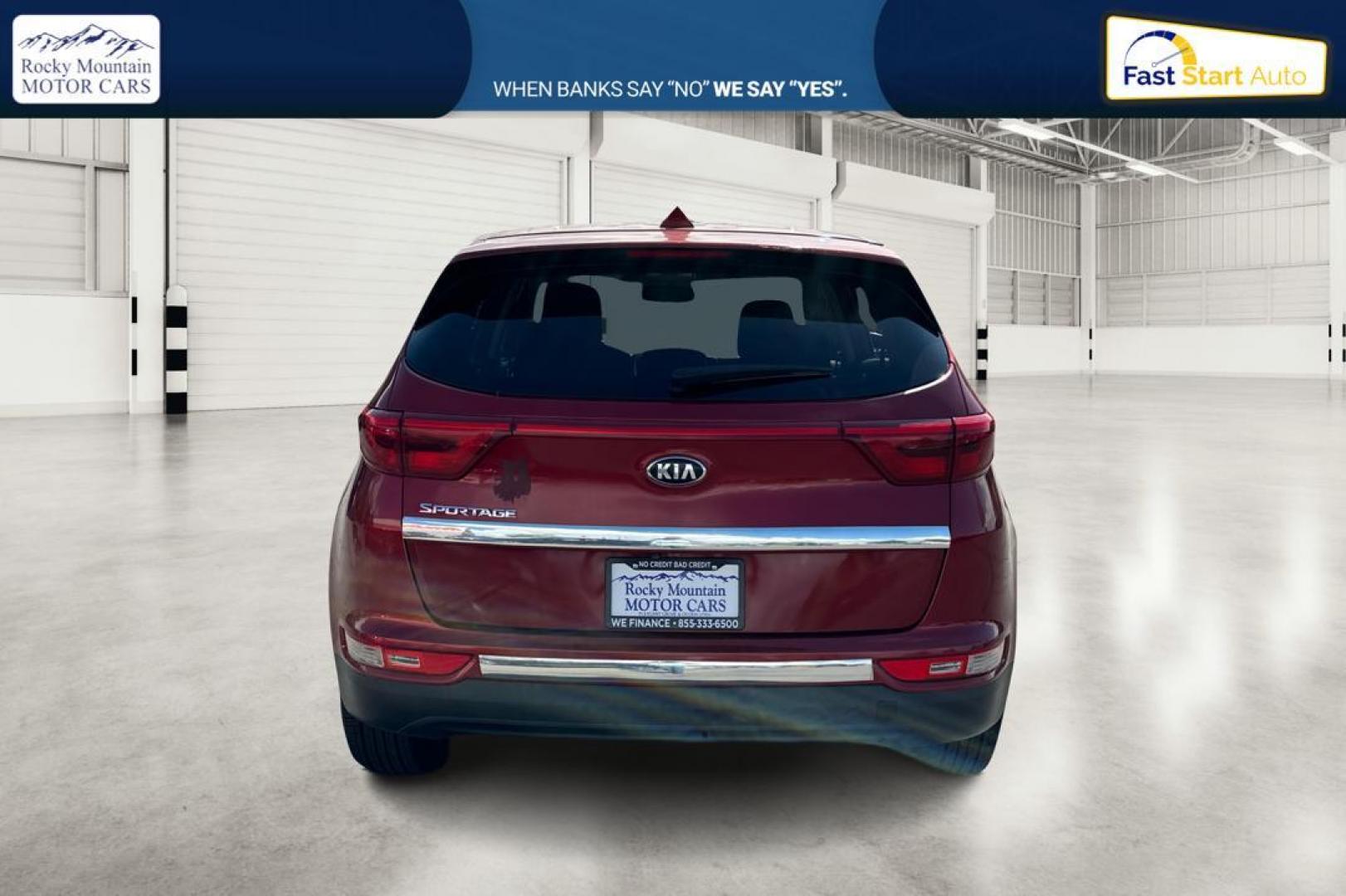 2018 Red Kia Sportage LX AWD (KNDPMCACXJ7) with an 2.4L V6 DOHC 24V engine, 6A transmission, located at 767 S State Road, Pleasant Grove, UT, 84062, (801) 785-1058, 40.354839, -111.736687 - Photo#3