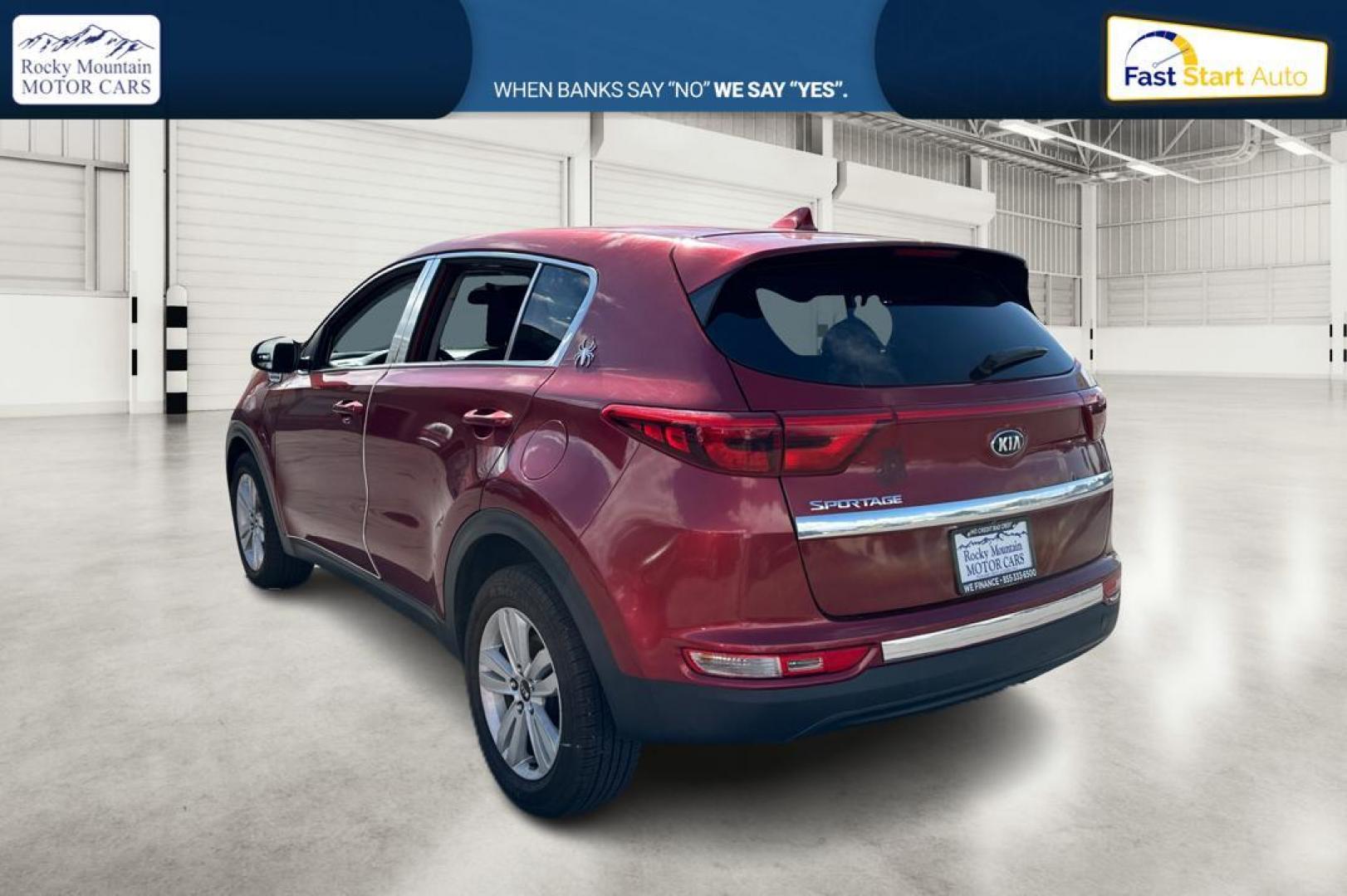 2018 Red Kia Sportage LX AWD (KNDPMCACXJ7) with an 2.4L V6 DOHC 24V engine, 6A transmission, located at 767 S State Road, Pleasant Grove, UT, 84062, (801) 785-1058, 40.354839, -111.736687 - Photo#4