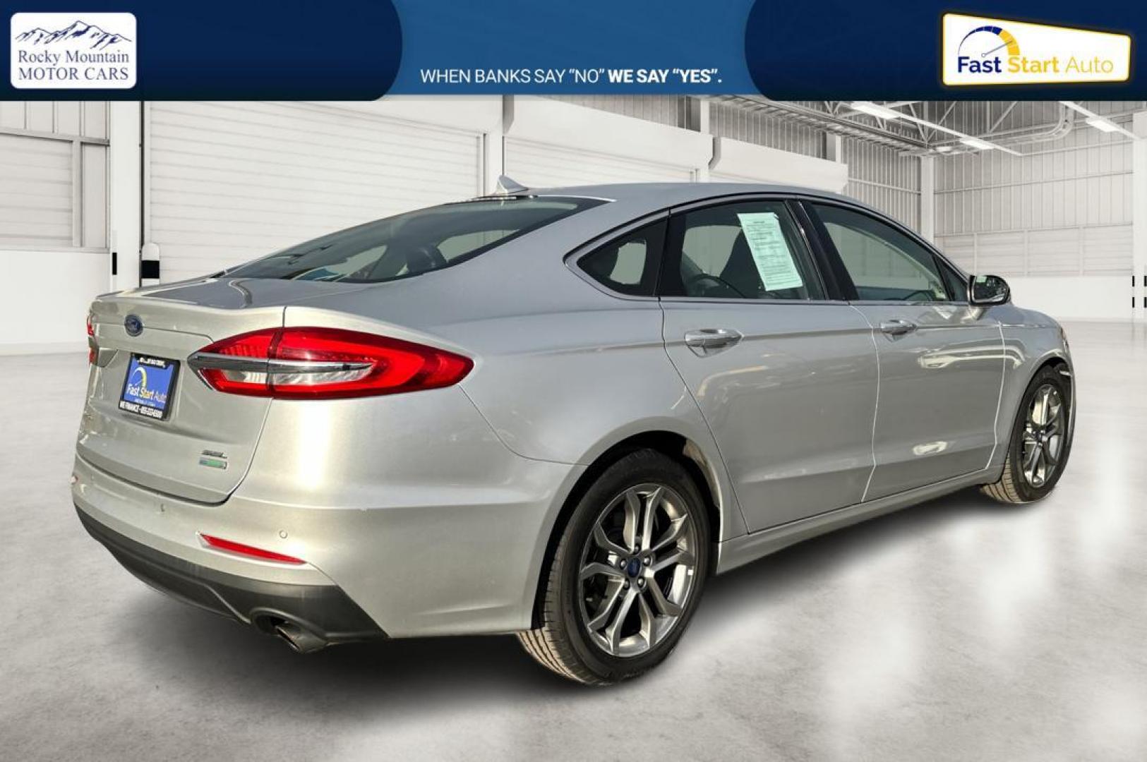 2019 Silver Ford Fusion SEL (3FA6P0CD1KR) with an 1.5L L4 DOHC 16V engine, 6A transmission, located at 7755 State Street, Midvale, UT, 84047, (801) 753-9063, 40.610329, -111.890656 - Photo#2