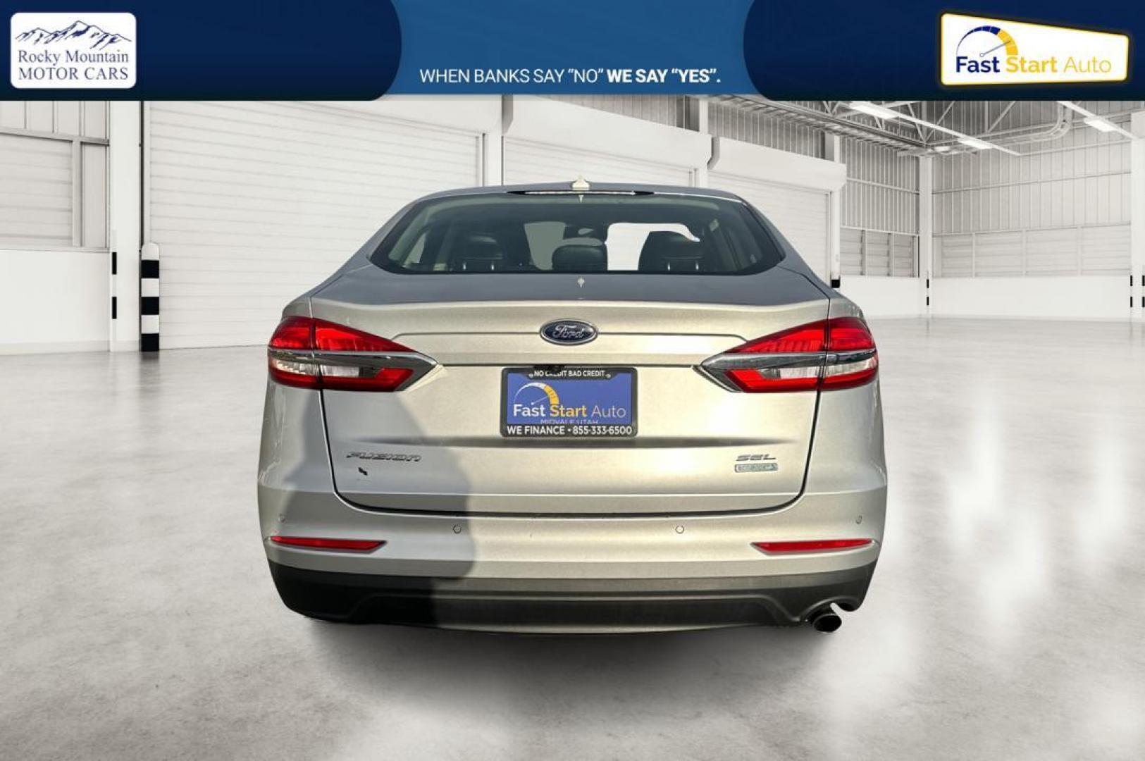 2019 Silver Ford Fusion SEL (3FA6P0CD1KR) with an 1.5L L4 DOHC 16V engine, 6A transmission, located at 7755 State Street, Midvale, UT, 84047, (801) 753-9063, 40.610329, -111.890656 - Photo#4