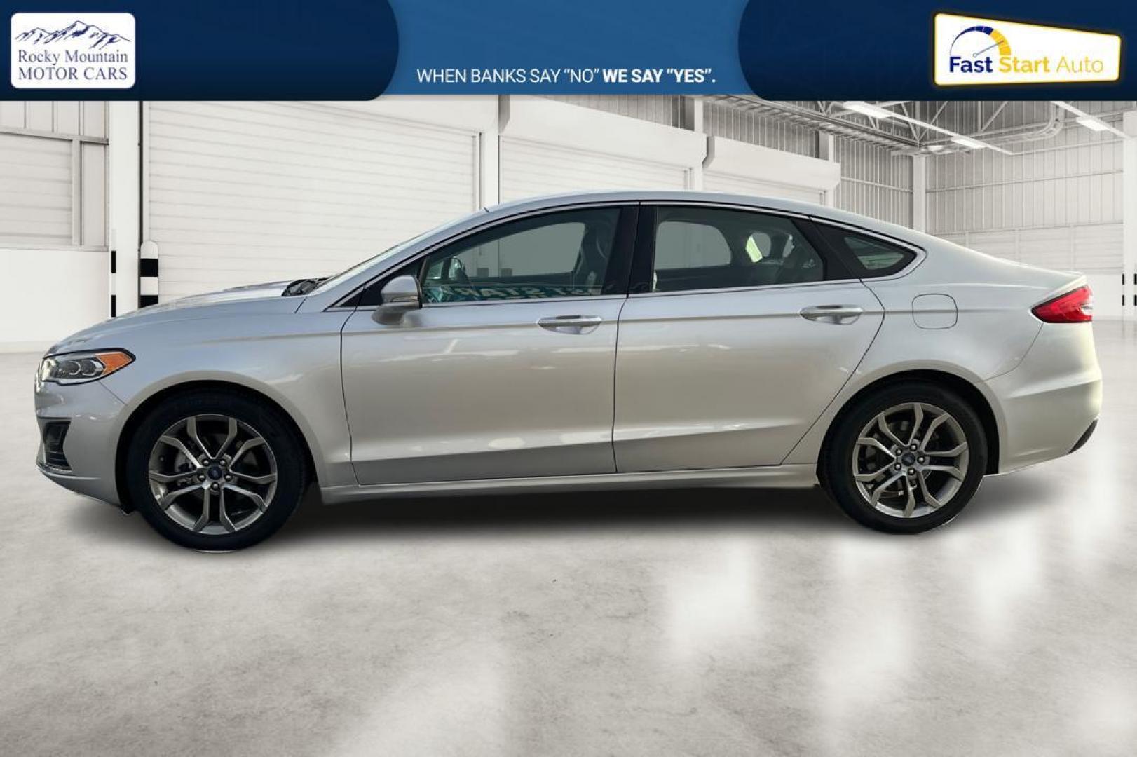 2019 Silver Ford Fusion SEL (3FA6P0CD1KR) with an 1.5L L4 DOHC 16V engine, 6A transmission, located at 7755 State Street, Midvale, UT, 84047, (801) 753-9063, 40.610329, -111.890656 - Photo#6