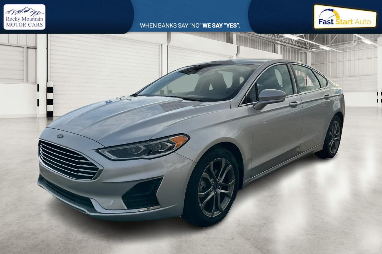 2019 Silver Ford Fusion SEL (3FA6P0CD1KR) with an 1.5L L4 DOHC 16V engine, 6A transmission, located at 7755 State Street, Midvale, UT, 84047, (801) 753-9063, 40.610329, -111.890656 - Photo#8