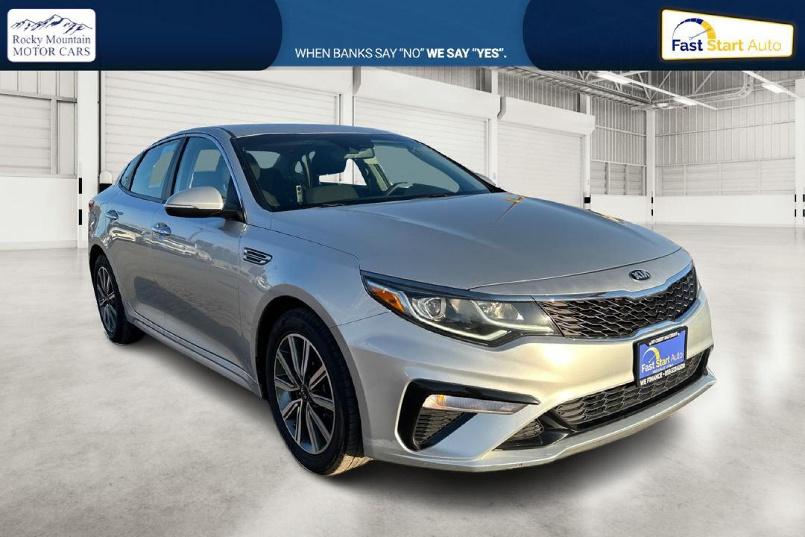 2019 Silver Kia Optima LX (5XXGT4L3XKG) with an 2.4L L4 DOHC 16V engine, 6A transmission, located at 7755 State Street, Midvale, UT, 84047, (801) 753-9063, 40.610329, -111.890656 - Photo#0