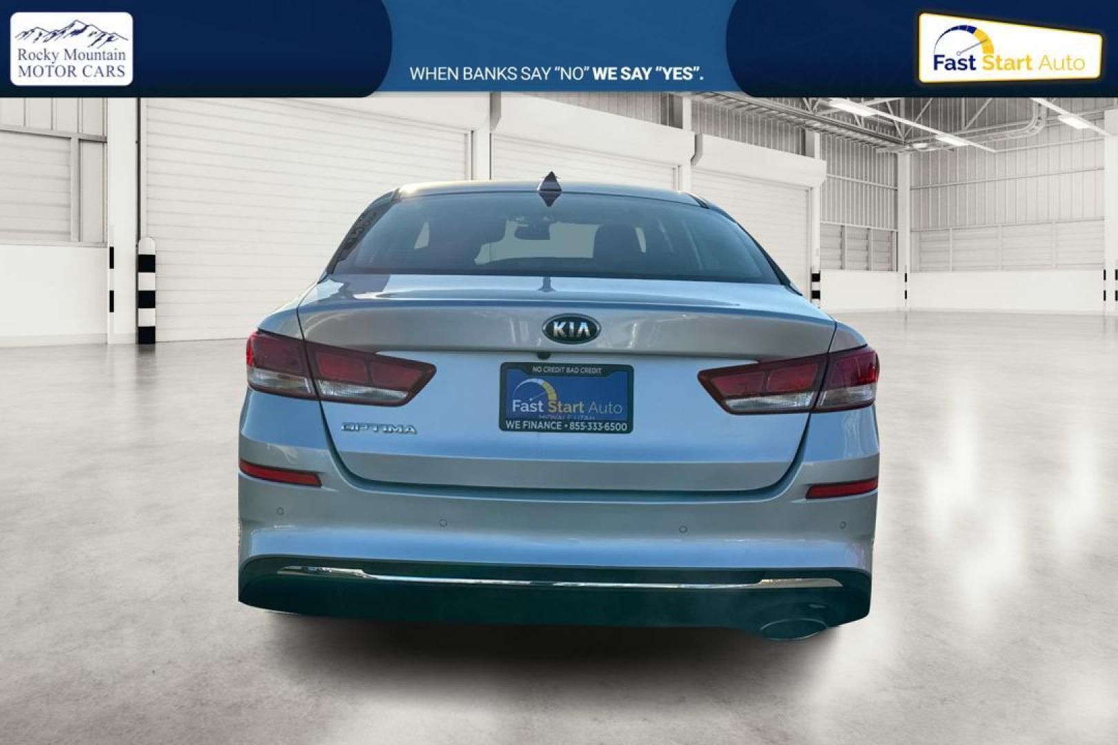 2019 Silver Kia Optima LX (5XXGT4L3XKG) with an 2.4L L4 DOHC 16V engine, 6A transmission, located at 7755 State Street, Midvale, UT, 84047, (801) 753-9063, 40.610329, -111.890656 - Photo#4