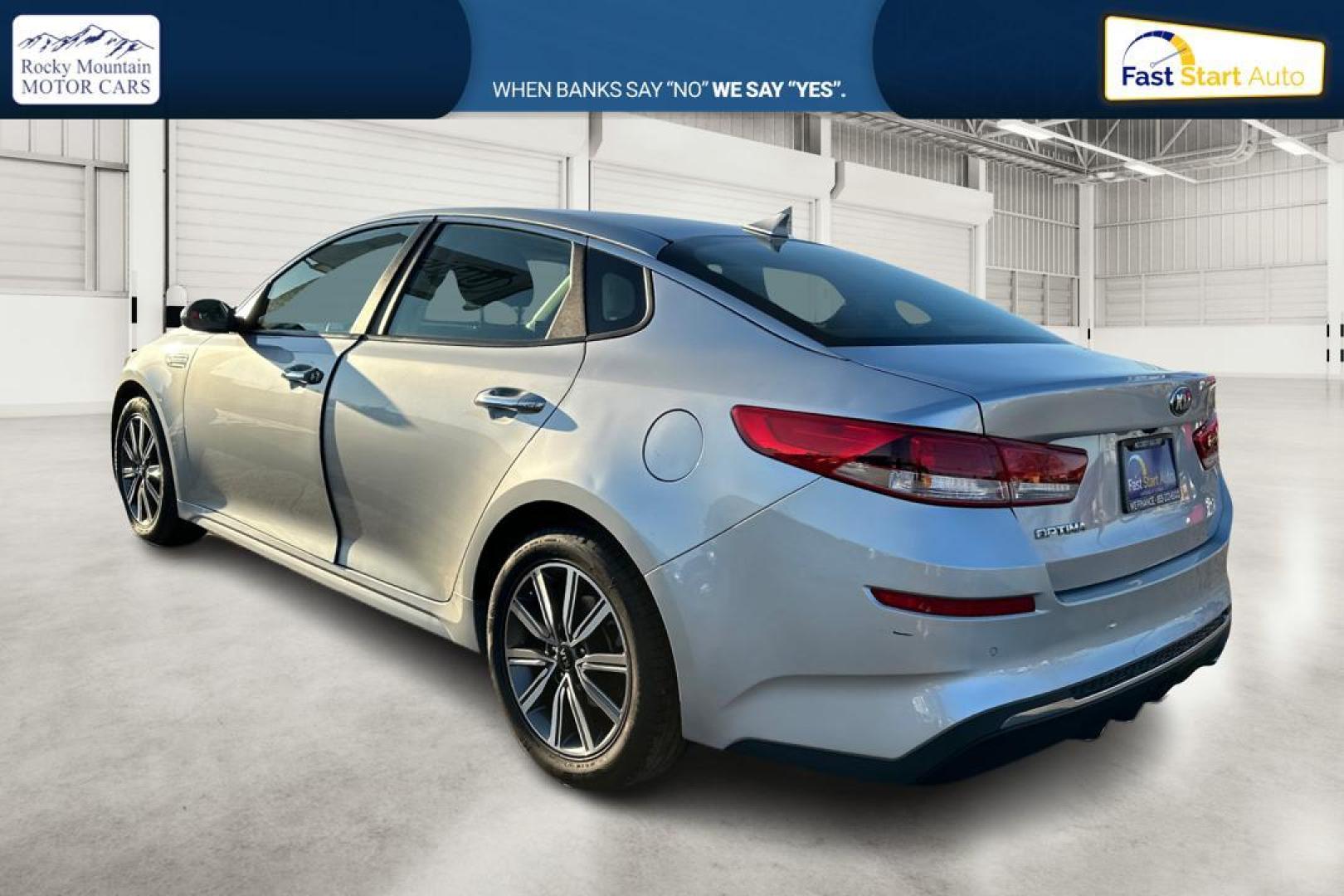 2019 Silver Kia Optima LX (5XXGT4L3XKG) with an 2.4L L4 DOHC 16V engine, 6A transmission, located at 7755 State Street, Midvale, UT, 84047, (801) 753-9063, 40.610329, -111.890656 - Photo#5