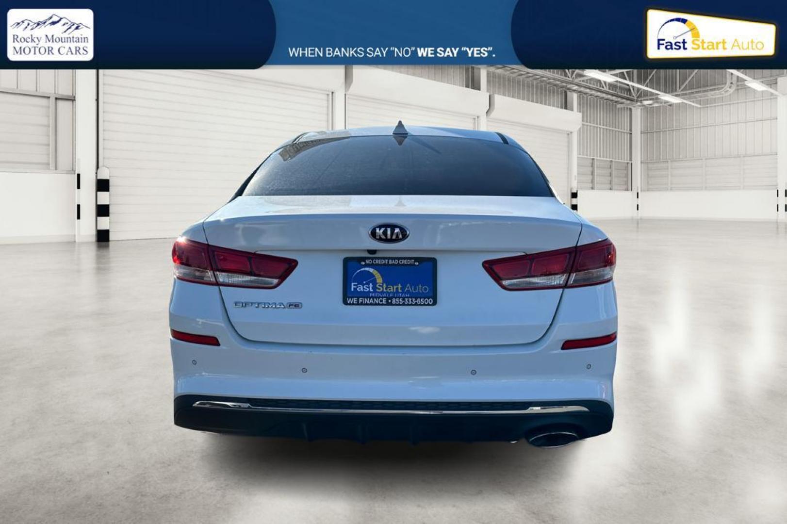 2019 White Kia Optima LX (5XXGT4L35KG) with an 2.4L L4 DOHC 16V engine, 6A transmission, located at 7755 State Street, Midvale, UT, 84047, (801) 753-9063, 40.610329, -111.890656 - Photo#4