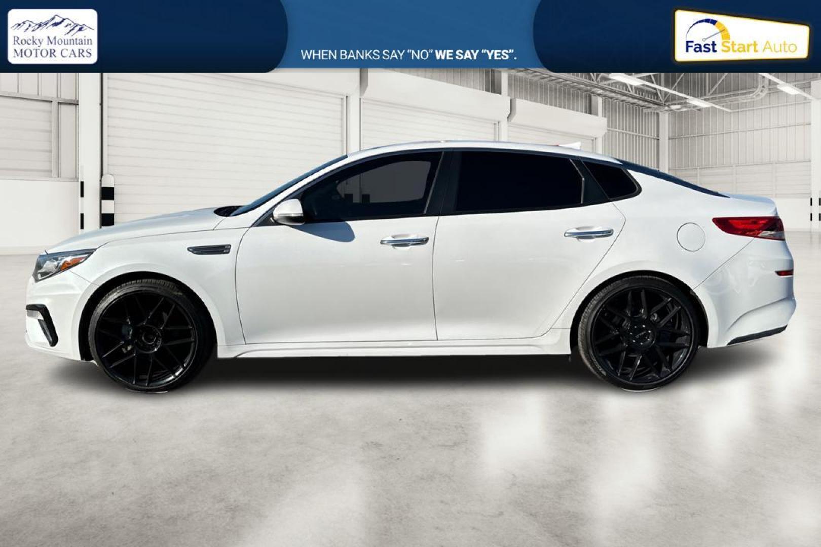 2019 White Kia Optima LX (5XXGT4L35KG) with an 2.4L L4 DOHC 16V engine, 6A transmission, located at 7755 State Street, Midvale, UT, 84047, (801) 753-9063, 40.610329, -111.890656 - Photo#6