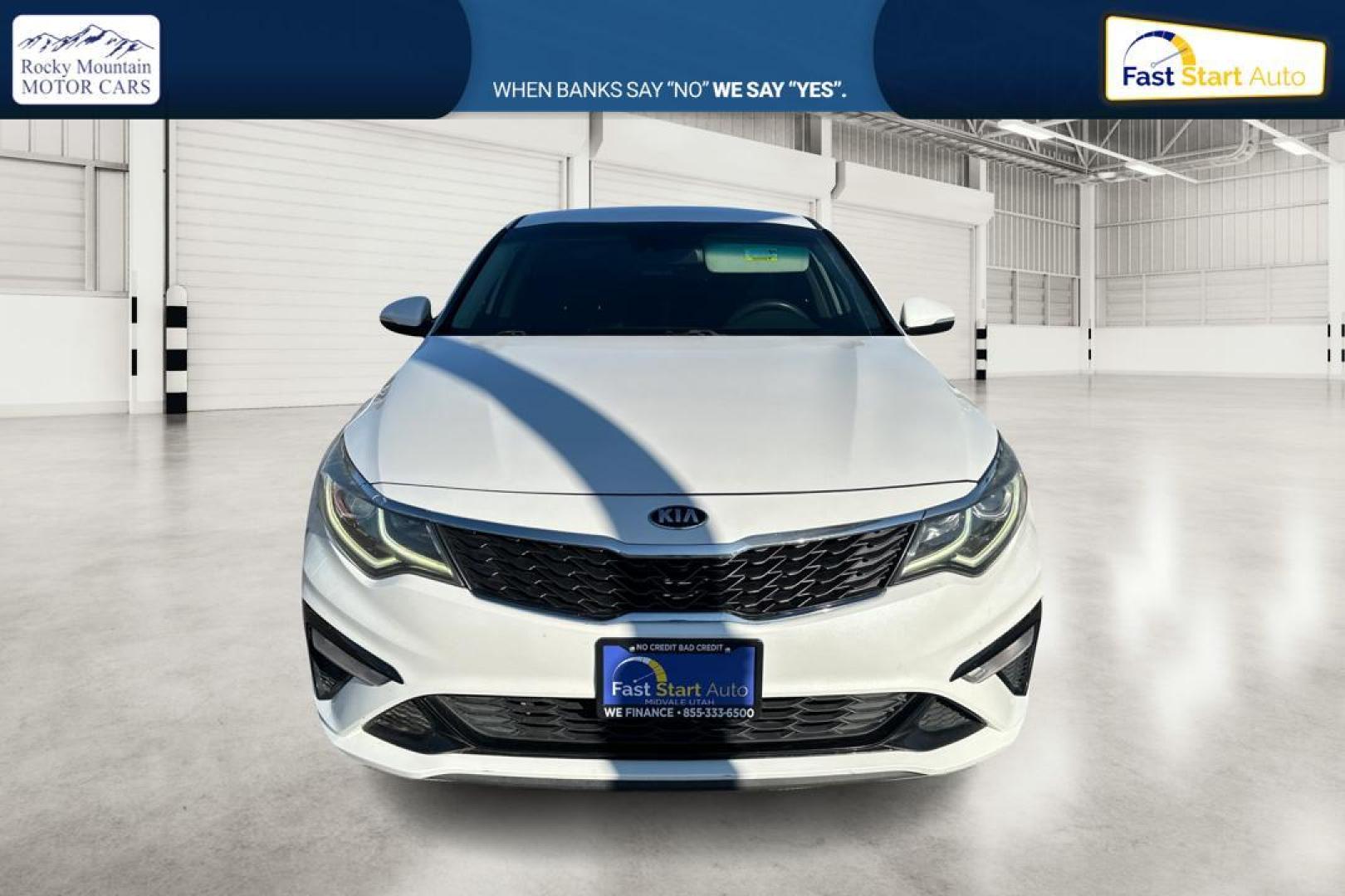 2019 White Kia Optima LX (5XXGT4L35KG) with an 2.4L L4 DOHC 16V engine, 6A transmission, located at 7755 State Street, Midvale, UT, 84047, (801) 753-9063, 40.610329, -111.890656 - Photo#9
