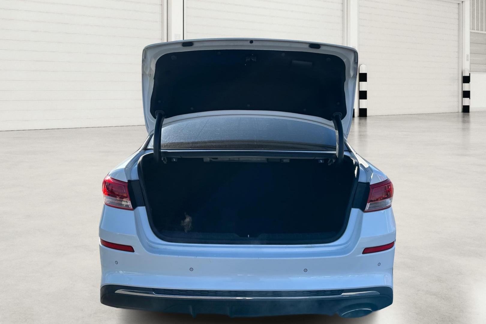 2019 White Kia Optima LX (5XXGT4L35KG) with an 2.4L L4 DOHC 16V engine, 6A transmission, located at 7755 State Street, Midvale, UT, 84047, (801) 753-9063, 40.610329, -111.890656 - Photo#13