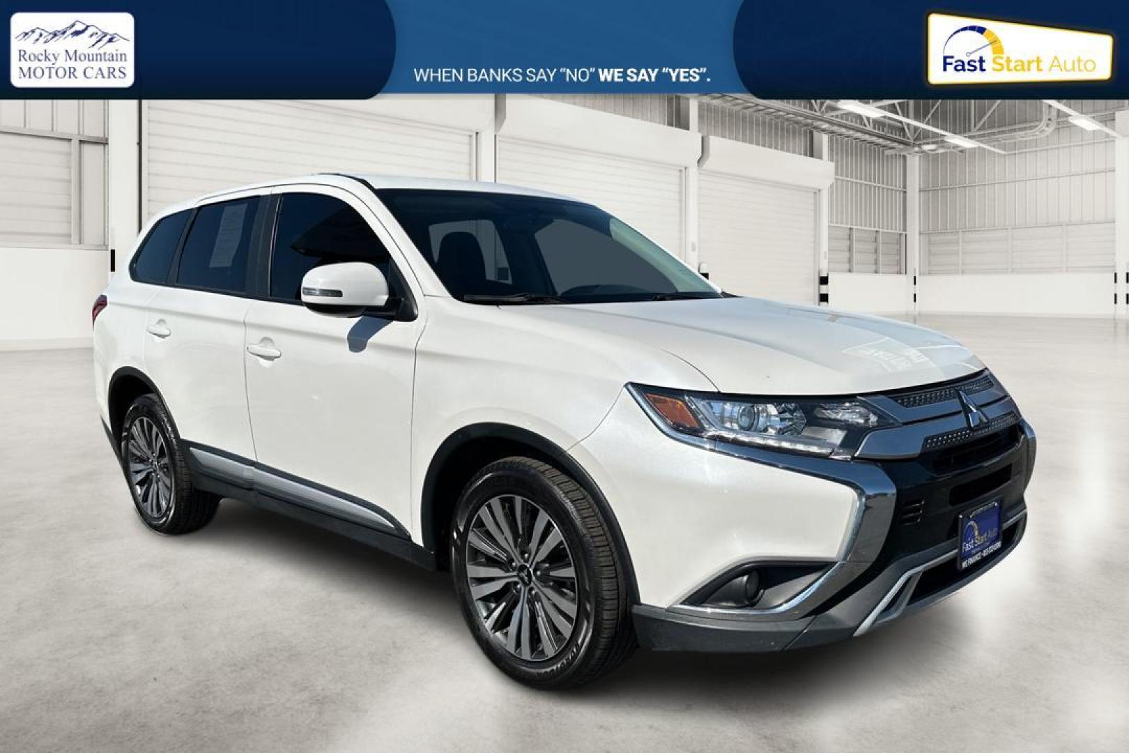 2019 White Mitsubishi Outlander SEL AWD (JA4AZ3A33KZ) with an 2.4L L4 DOHC 16V engine, CVT transmission, located at 7755 State Street, Midvale, UT, 84047, (801) 753-9063, 40.610329, -111.890656 - Photo#0