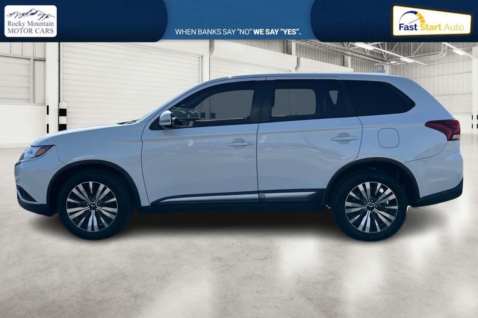 2019 White Mitsubishi Outlander SEL AWD (JA4AZ3A33KZ) with an 2.4L L4 DOHC 16V engine, CVT transmission, located at 7755 State Street, Midvale, UT, 84047, (801) 753-9063, 40.610329, -111.890656 - Photo#5